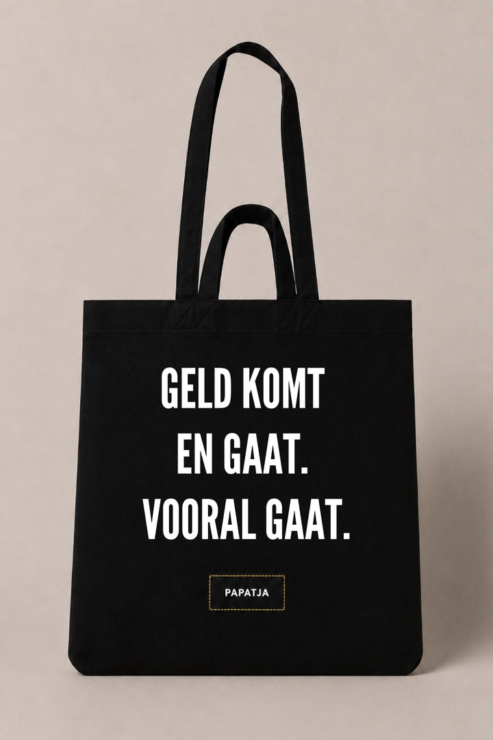 Zwarte katoenen PAPATJA tas met de tekst Geld komt en gaat. Vooral gaat.