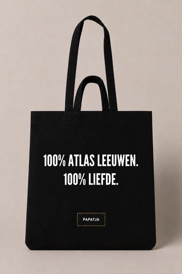 Zwarte katoenen PAPATJA tas met de tekst 100% Atlas Leeuwen. 100% liefde., voor Marokko fans en supporters van de Atlas Leeuwen.
