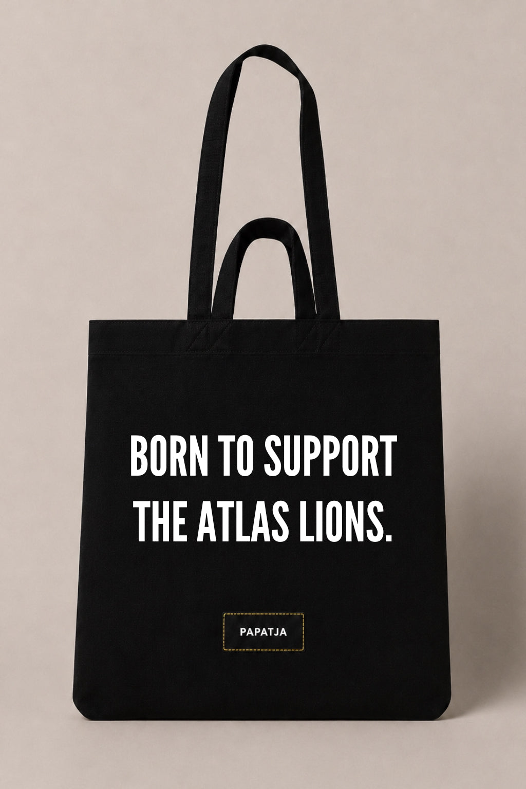 Zwarte katoenen PAPATJA tas met de tekst Born to support the Atlas Lions, voor Marokko fans en supporters van de Atlas Leeuwen.