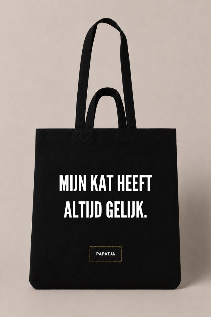 Zwarte katoenen PAPATJA tas met de tekst Mijn kat heeft altijd gelijk, leuk cadeau voor kattenliefhebbers met humor.